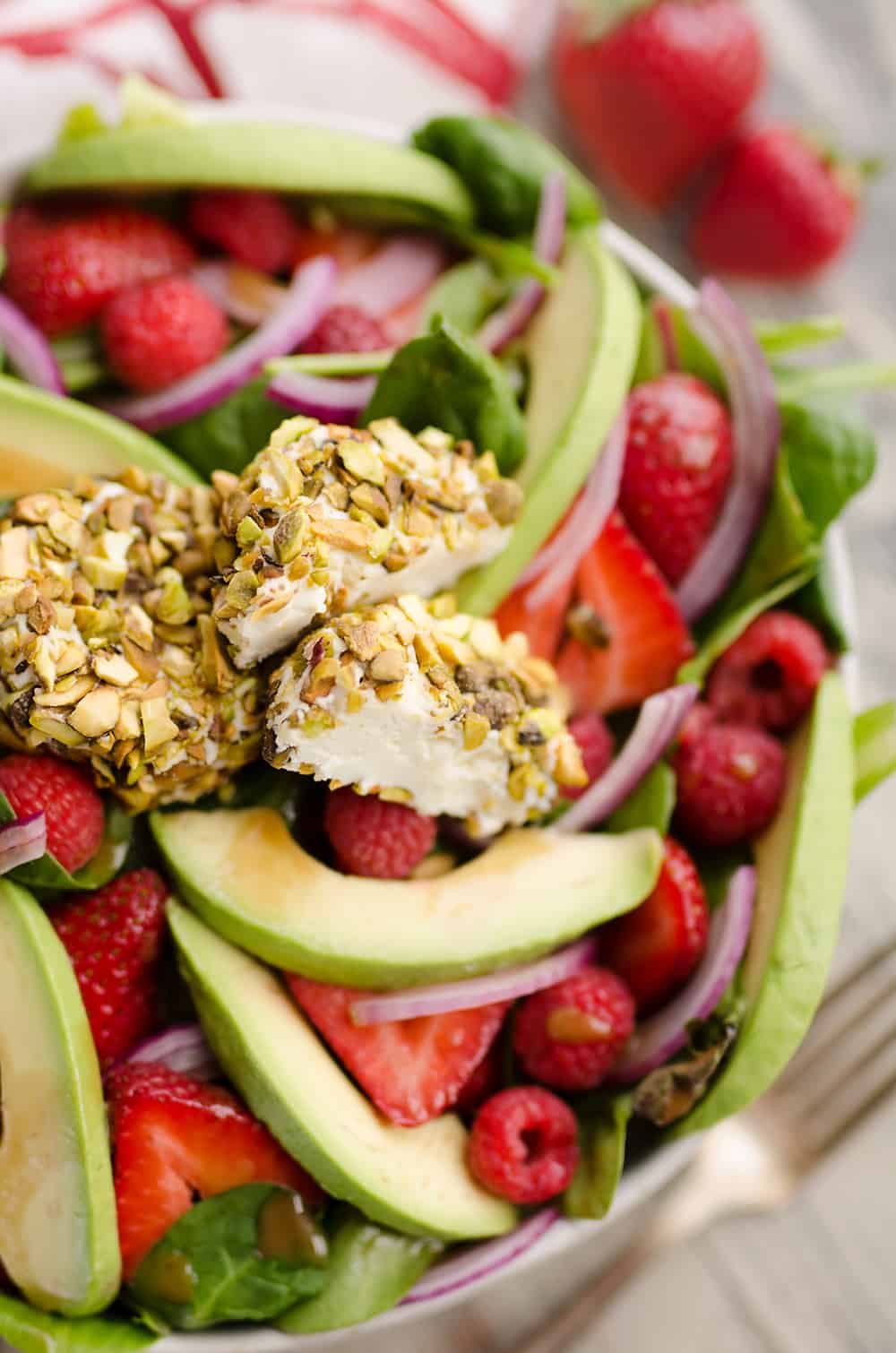 Pistachio Crusted Goat Cheese Berry Salad served