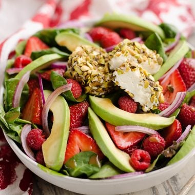 Pistachio Crusted Goat Cheese Berry Salad in large bowl