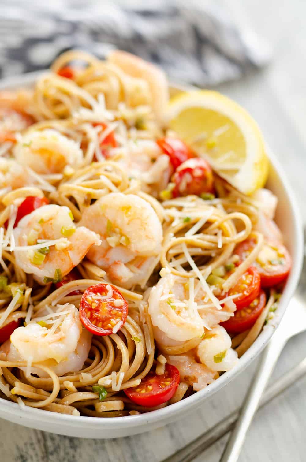 Parmesan Lemon Shrimp Linguine in serving bowl with utensils