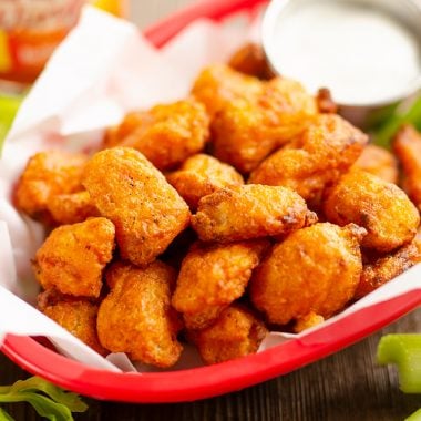 Airfryer Buffalo Cauliflower Tots served with celery and ranch