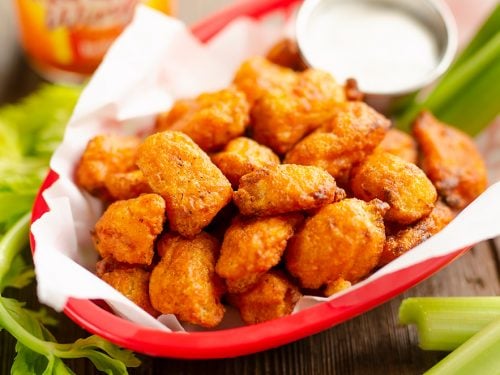 Airfryer Buffalo Cauliflower Tots served with celery and ranch