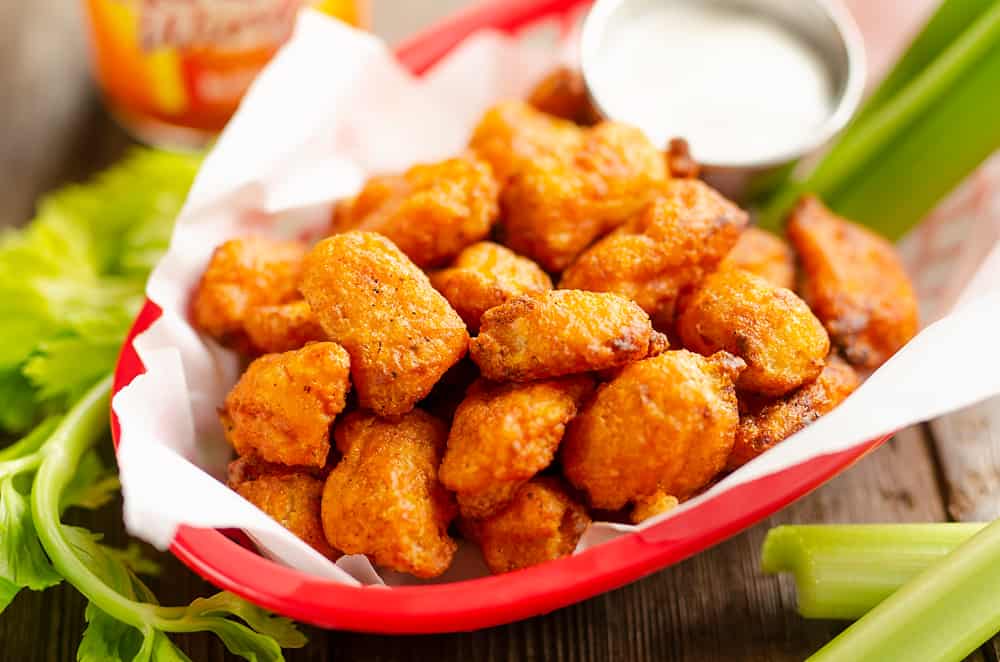 Airfryer Buffalo Cauliflower Tots served with celery and ranch