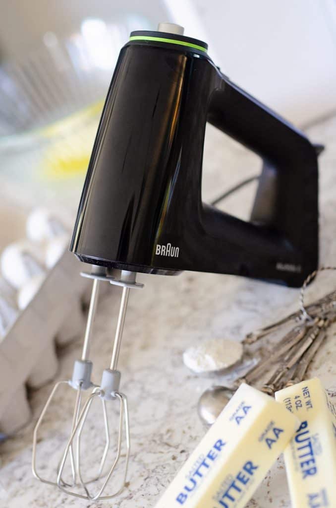 Braun MultiMix Hand Mixer in kitchen with baking ingredients