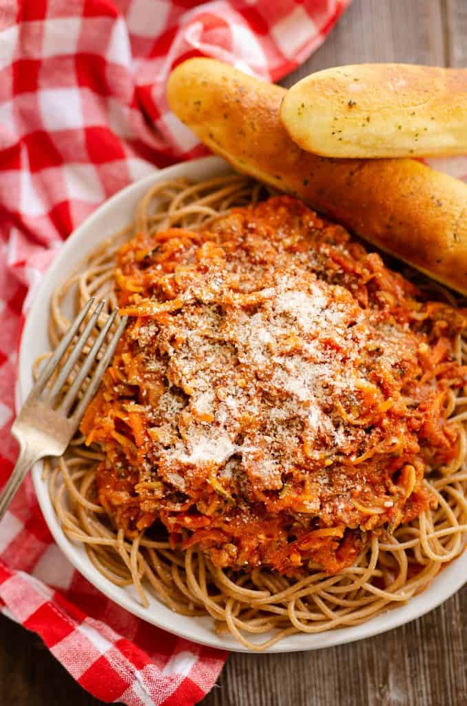 whole wheat spaghetti and vegetables serving