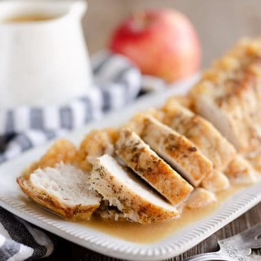 Pressure Cooker Pork Loin with Bourbon Apple Sauce in Instant Pot served on the table