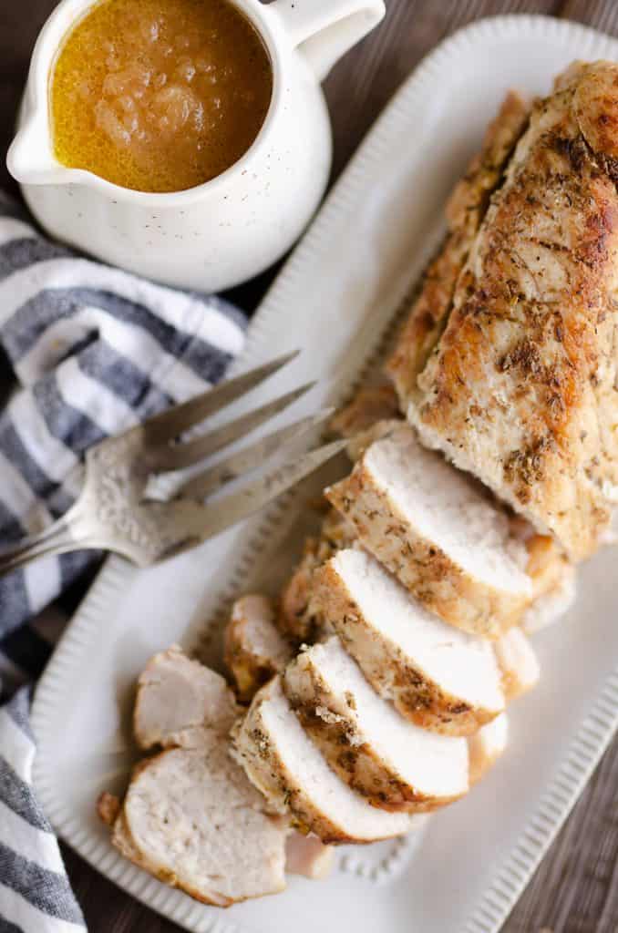 Pressure Cooker Pork Loin with Bourbon Apple Sauce in Instant Pot sliced and served