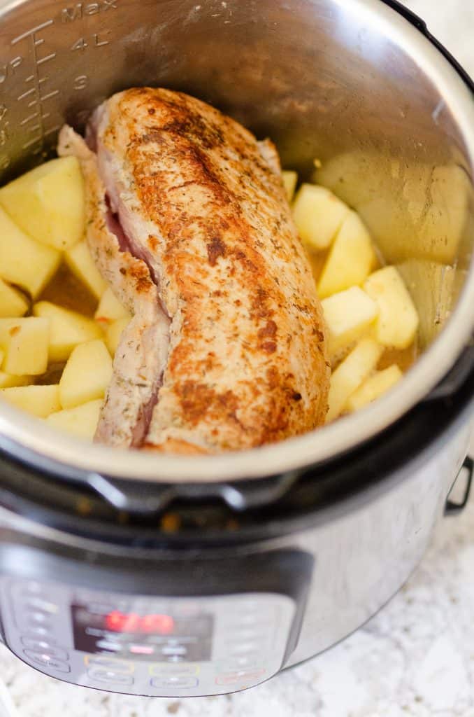 Pressure Cooker Pork Loin with Bourbon Apple Sauce in Instant Pot