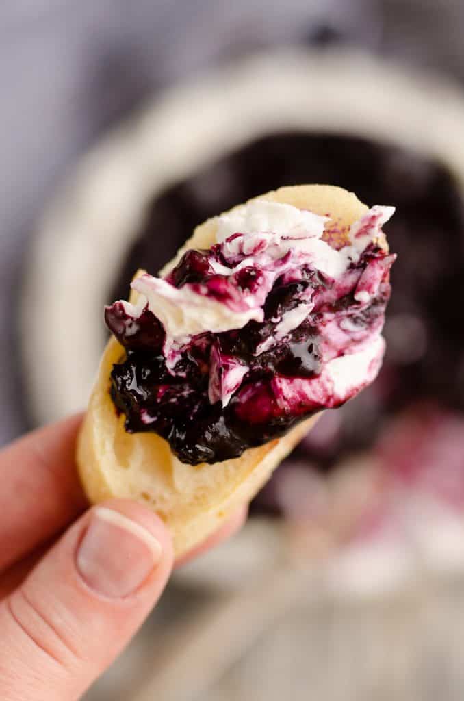 Blueberry Balsamic Goat Cheese Appetizer dip served on crusty french bread