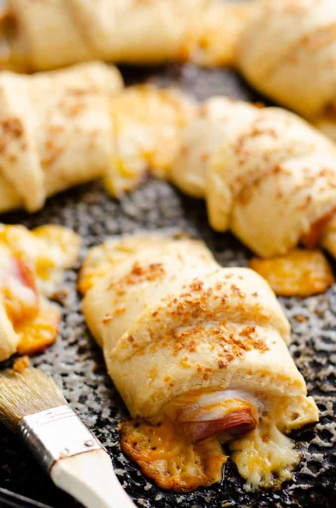 Hot Ham & Cheese Roll Ups on baking pan