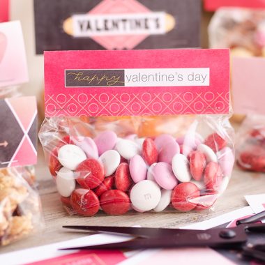 Free Printable Valentine Treat Bag Toppers filled with M&M candy