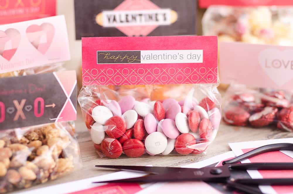 Free Printable Valentine Treat Bag Toppers filled with M&M candy
