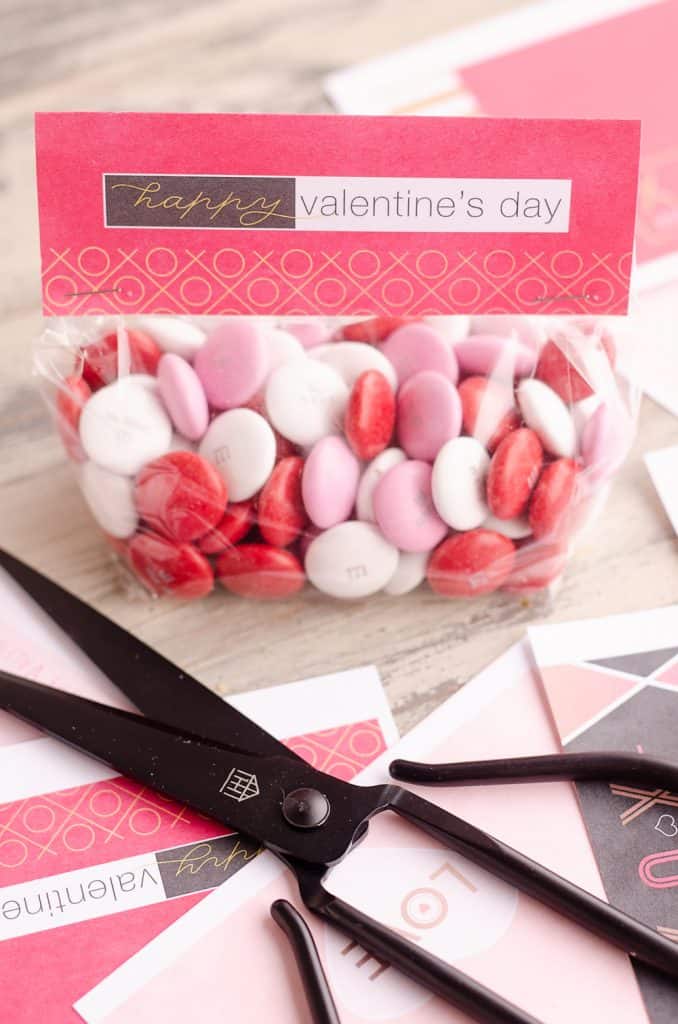 Free Printable Valentine Treat Bag Toppers assembled and filled with candy