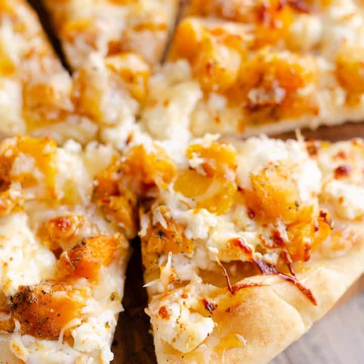 Airfryer Squash & Goat Cheese Pizza sliced with honey
