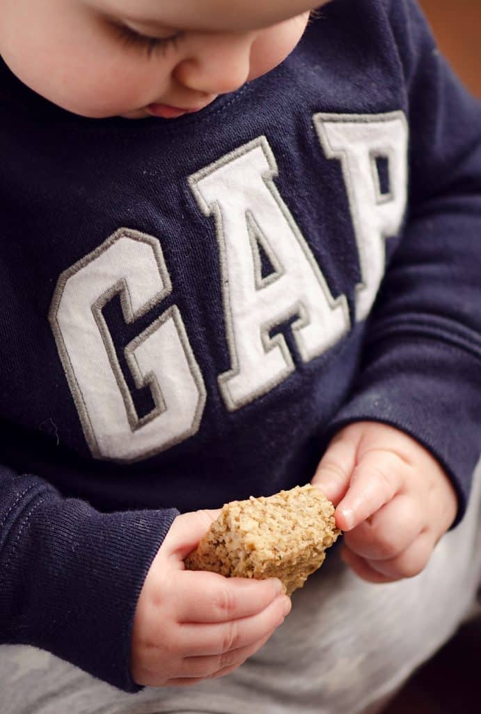 Baby holding Kids No Sugar Peanut Butter Banana Oatmeal Bars