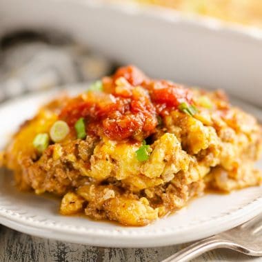 Light Mexican Breakfast Casserole topped with salsa