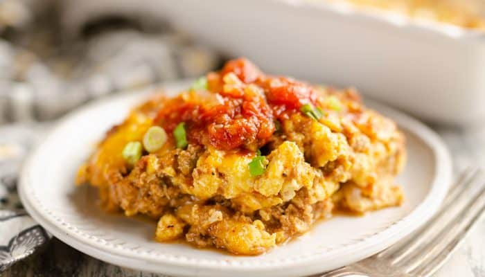 Light Mexican Breakfast Casserole topped with salsa