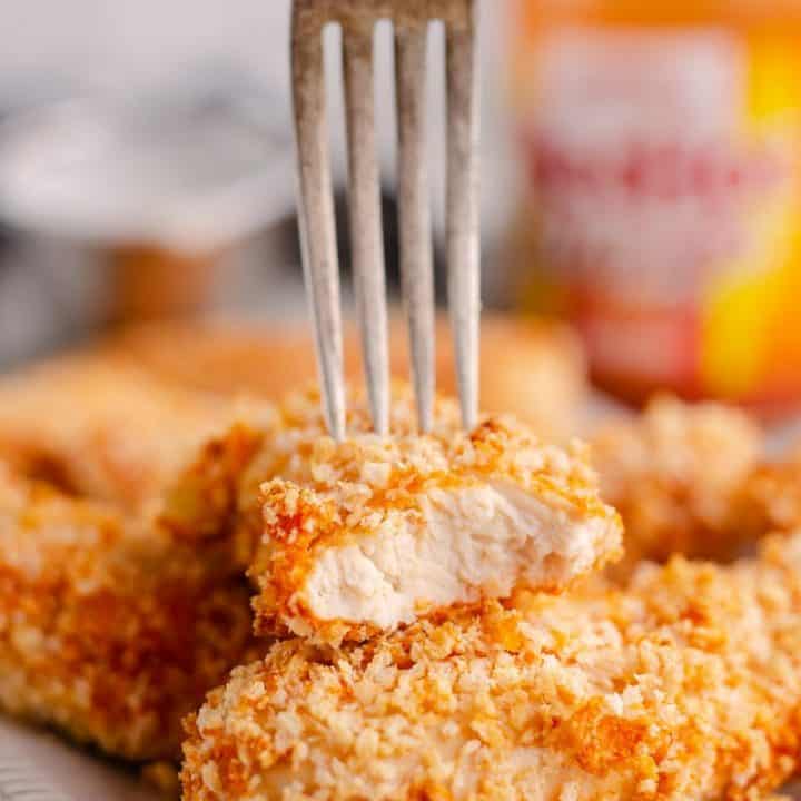 Air Fryer Buffalo Chicken Strips bite with fork