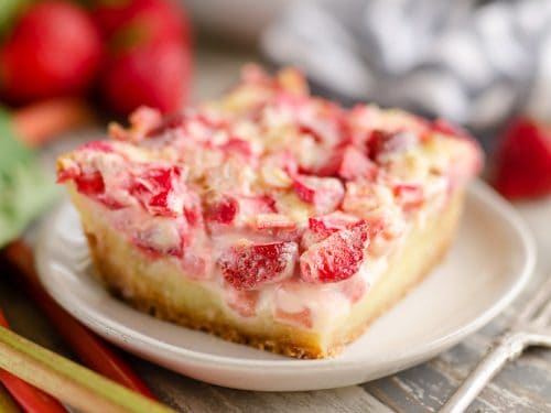 Strawberry Rhubarb Custard Dessert slice on plate