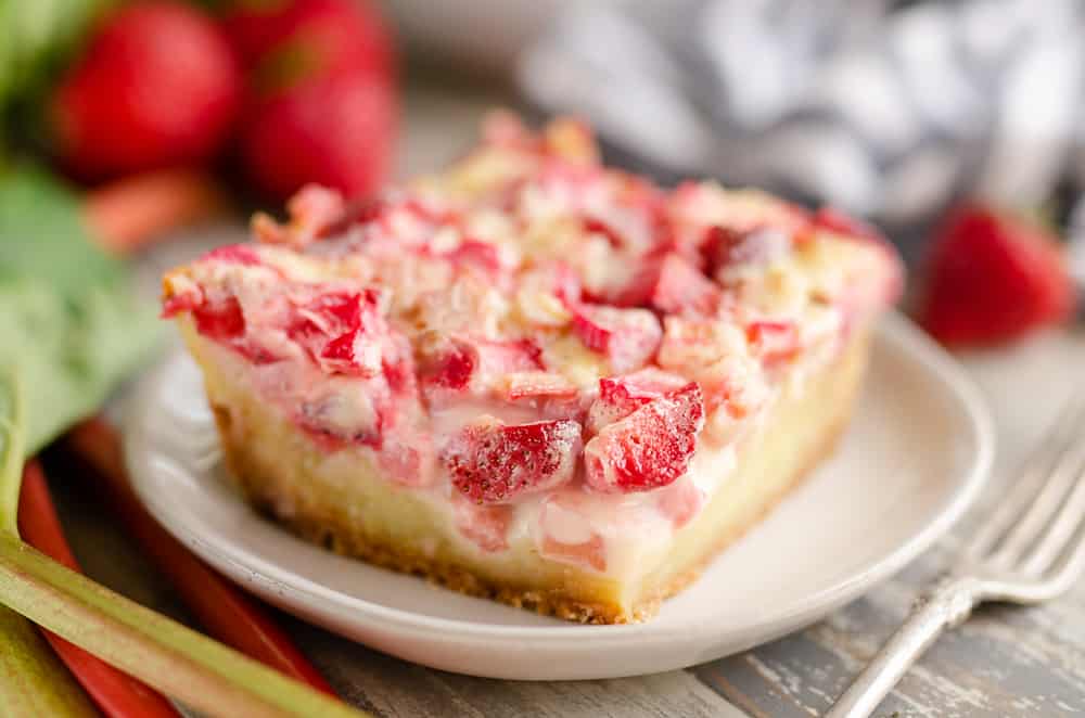 Strawberry Rhubarb Custard Dessert slice on plate