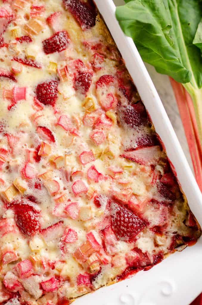 Strawberry Rhubarb Custard Dessert pan with rhubarb stalks