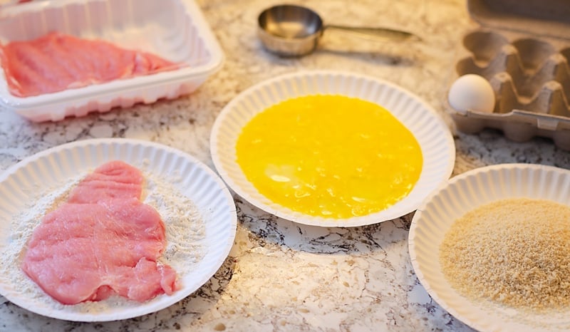 Crispy Air Fryer Breaded Pork Chops being made with panko breading