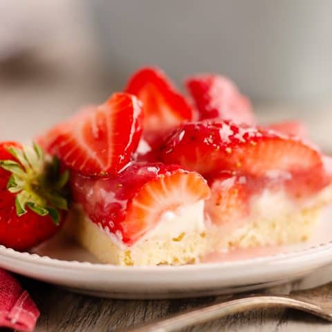 slice of strawberry pie bar on plate