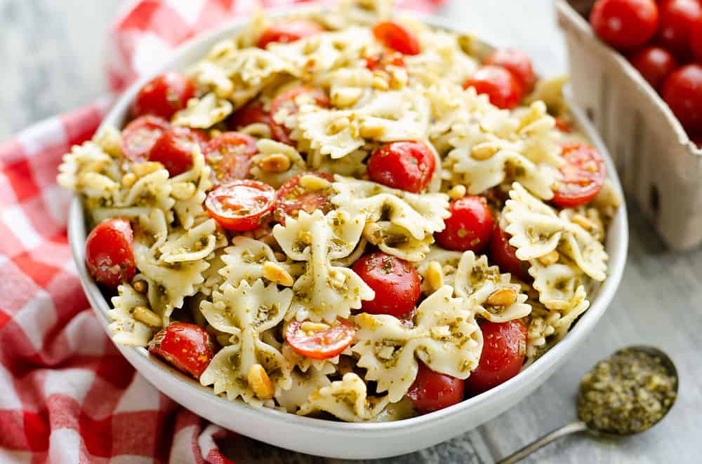 Fresh Tomato Pesto Pasta Salad served on dinner table