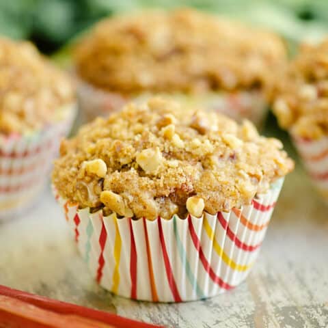 rhubarb muffins topped with brown sugar and walnut streusel on table