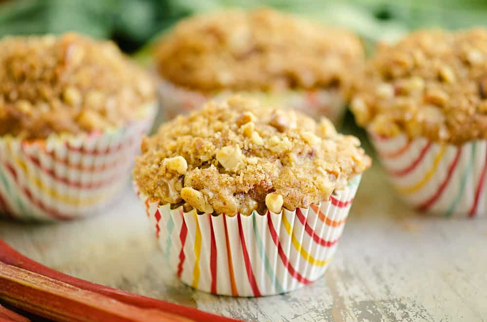 rhubarb muffins topped with brown sugar and walnut streusel on table