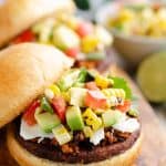 Southwest Black Bean Burgers topped with grilled salsa