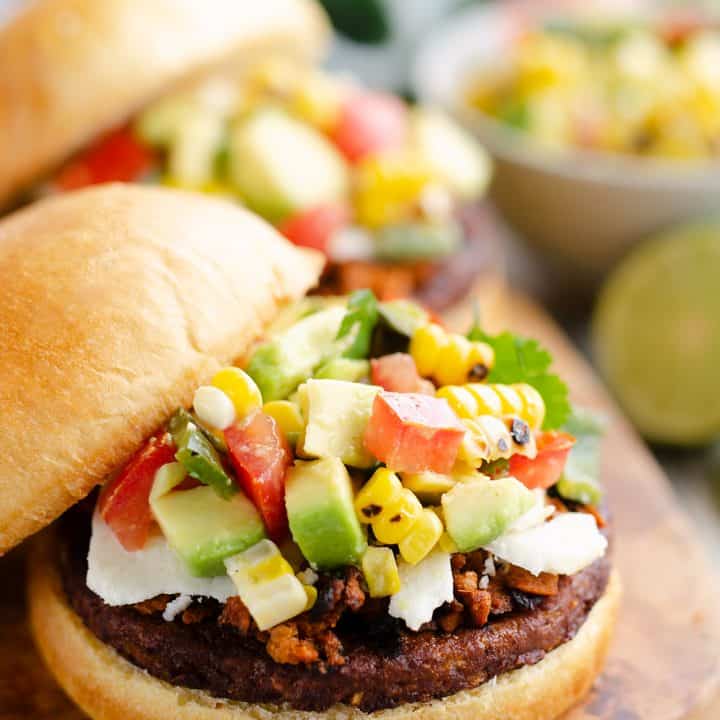 Southwest Black Bean Burgers topped with grilled salsa