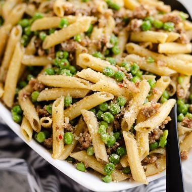 Brown Butter Sausage Penne Pasta served with large spoon