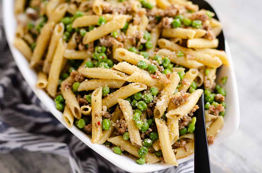 Brown Butter Sausage Penne Pasta served with large spoon