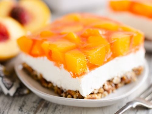 Peach Pretzel Salad Dessert slice served on plate