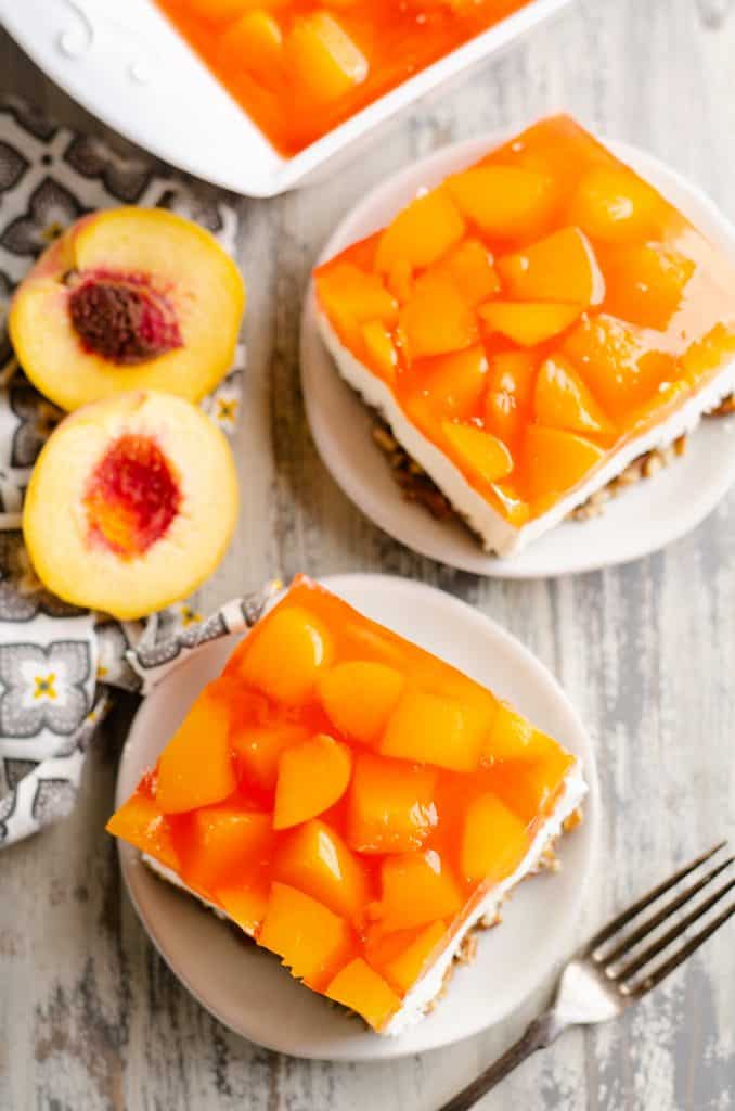 Peach Pretzel Salad Dessert slices served up on table