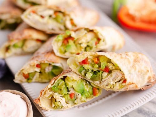 Air Fryer Avocado Chicken Egg Rolls served on appetizer plate