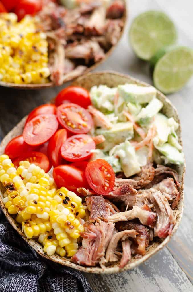 Pulled Pork Bowls with Avocado Slaw served on counter