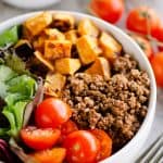 Sweet Potato Taco Bowls served with salsa and sour cream