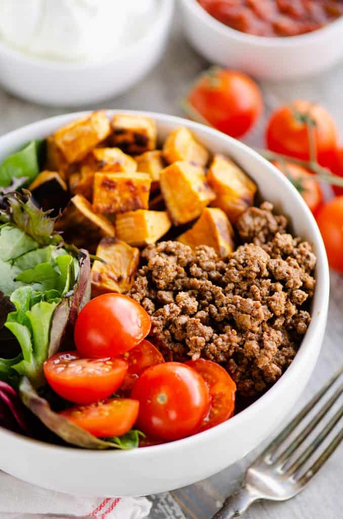 Sweet Potato Taco Bowls served with salsa and sour cream