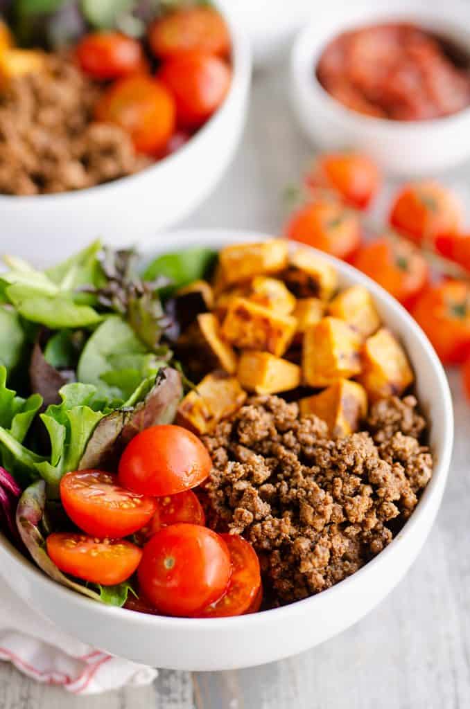 Sweet Potato Taco Bowls with cherry tomatoes