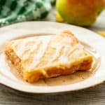 Glazed Apple Pie Bars square piece on plate