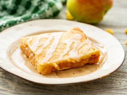 Glazed Apple Pie Bars square piece on plate