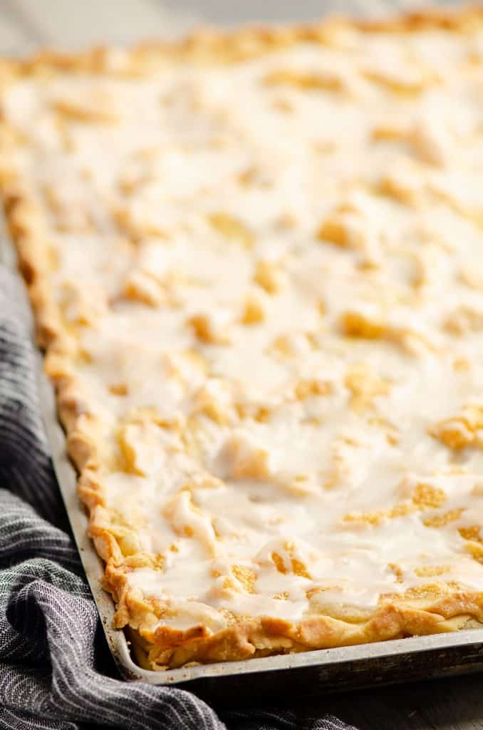 Glazed Apple Pie Bars in rimmed cookie sheet