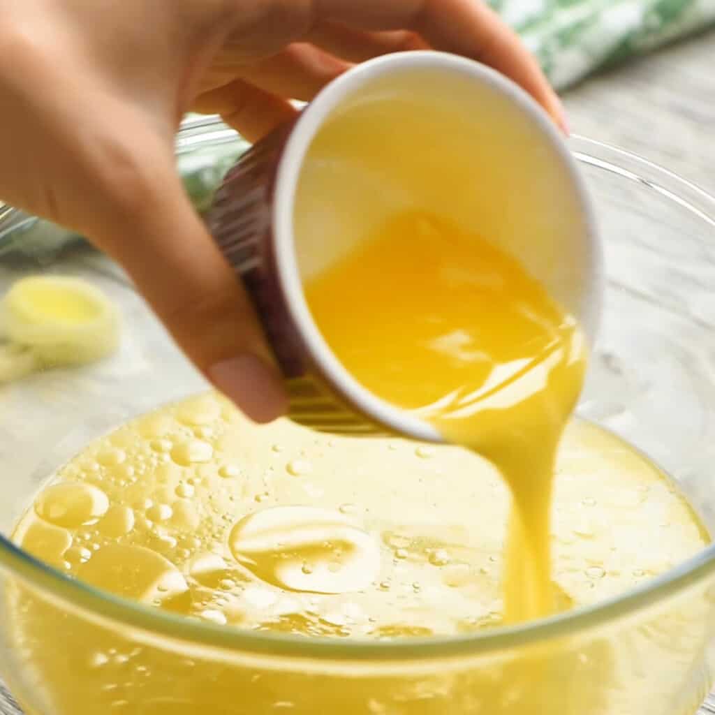 butter poured in broth bowl