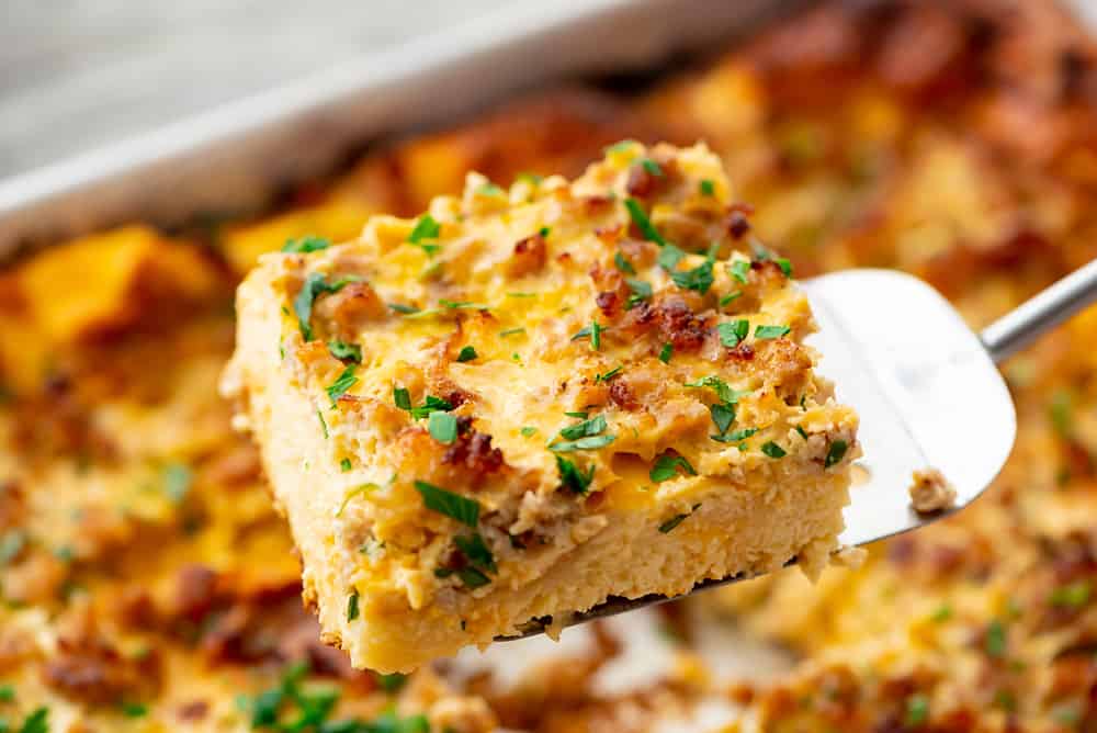 Overnight Sausage Egg Casserole on spatula