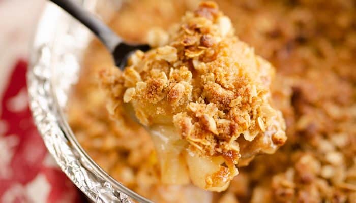 Crispy Pressure Cooker Apple Crisp scooped from pan