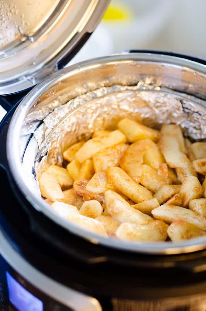 apples being cooked in Instant Pot for Crispy Pressure Cooker Apple Crisp