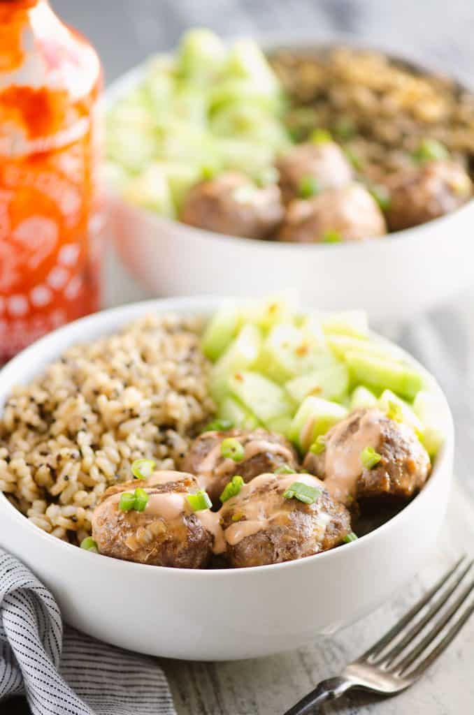 Honey Sriracha Meatball Bowls served on dinner table