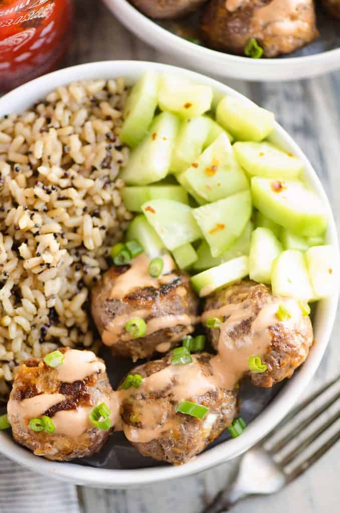 Honey Sriracha Meatball Bowls served with fork