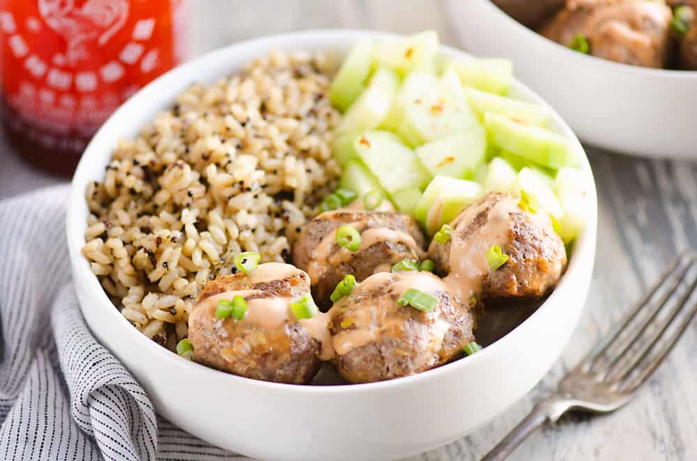 Honey Sriracha Meatball Bowls on table